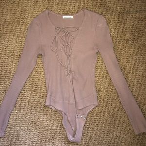 Lace up beige body suit